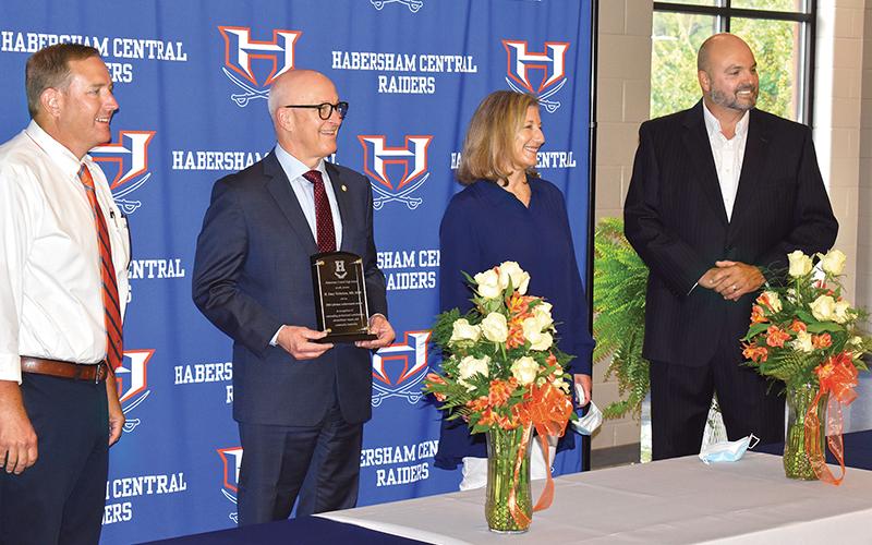 Dr. Stacy Nicholson (second from left) accepts Habersham Central High School’s first lifetime achievement award from Principal Jonathan Stribling, Gifted Coordinator Martha Cantrell and Superintendent Matthew Cooper at a ceremony Friday night.