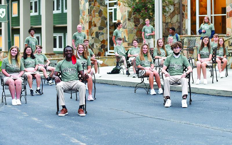 Members of the Tallulah Falls School Class of 2021 gather to watch the sunrise on Aug. 24, the first day of the academic year. The school’s enrollment for the 2020-21 academic year is 531 students – 423 day students and 108 boarding students, representing 16 countries. Photo by E. LANE GRESHAM