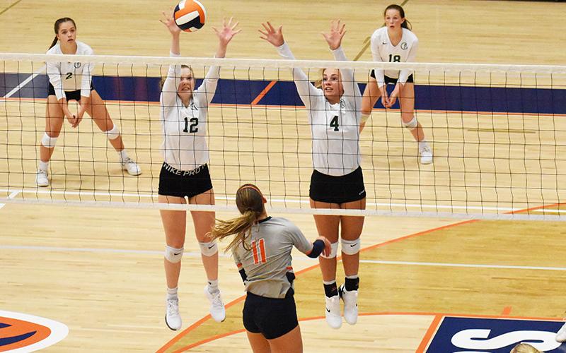 Tallulah Falls’ Barrett Whitener (12) and Abby Carlan (4) protect the net during their match with Habersham Central on Tuesday night.