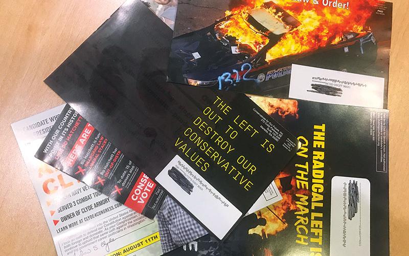 Political flyers with extreme messages have been hitting mailboxes for weeks leading up to Tuesday’s runoff election.