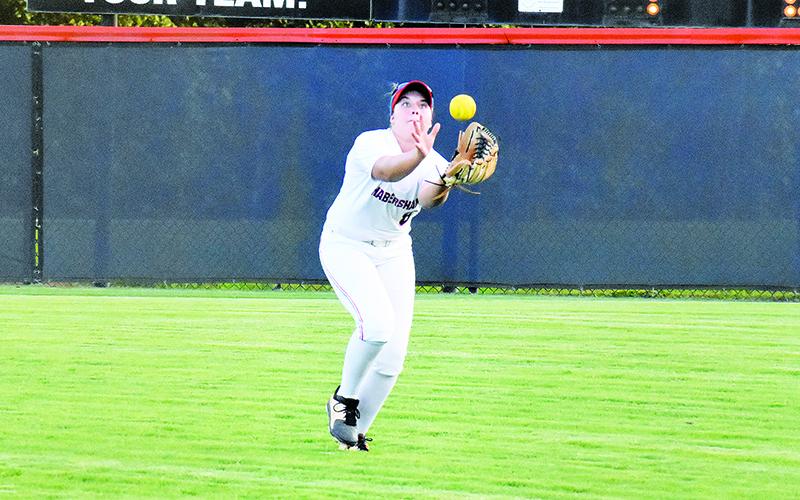 Habersham Central’s Joey Handlos makes a running catch in the outfield on Thursday night against Lanier.