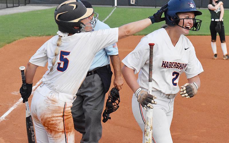 Brayden Staton and Preslee Hix celebrate after Hix’s sixth-inning go ahead home run. Photo by CODY ROGERS/Staff