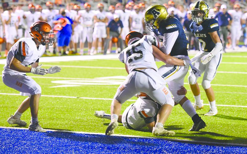 Habersham Central’s Patrick Tedder (15) makes the hit to help the Raiders make a goal line stand against Apalachee last week. TOM ASKEW/Special