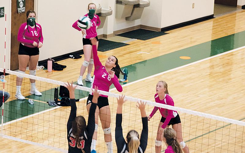 Junior middle hitter Alba Romanos elevates for a spike against George Walton Academy. Since arriving from Spain and joining TFS’ volleyball team, Romanos has brought much-needed length to the team defensively and an offensive skill set that has grown in each match.