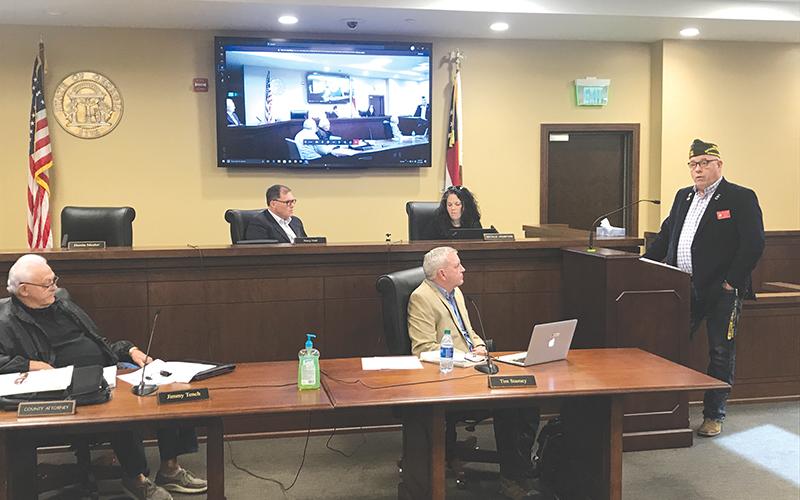 VFW District Commander Bill Miles talks at Monday’s Habersham County Board of Commissioners meeting. Listening are Commissioners Jimmy Tench and Tim Stamey (bottom row), Stacy Hall and Natalie Crawford (top row).