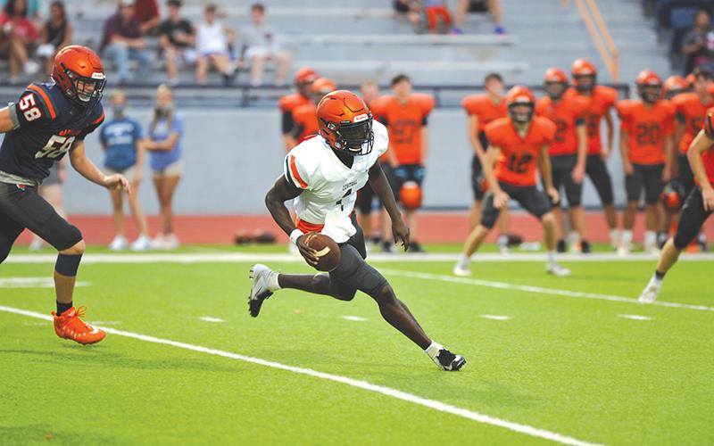 Josh Pickett scrambles during the scrimmage.