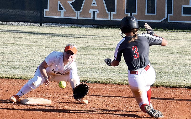 Habersham Central’s Brayden Staton waits for the throw as a Winder-Barrow runner tries to beat the tag.
