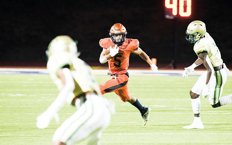Habersham Central’s Jackson Clouatre always has his eyes downfield, planning his next move. TOM ASKEW/Special