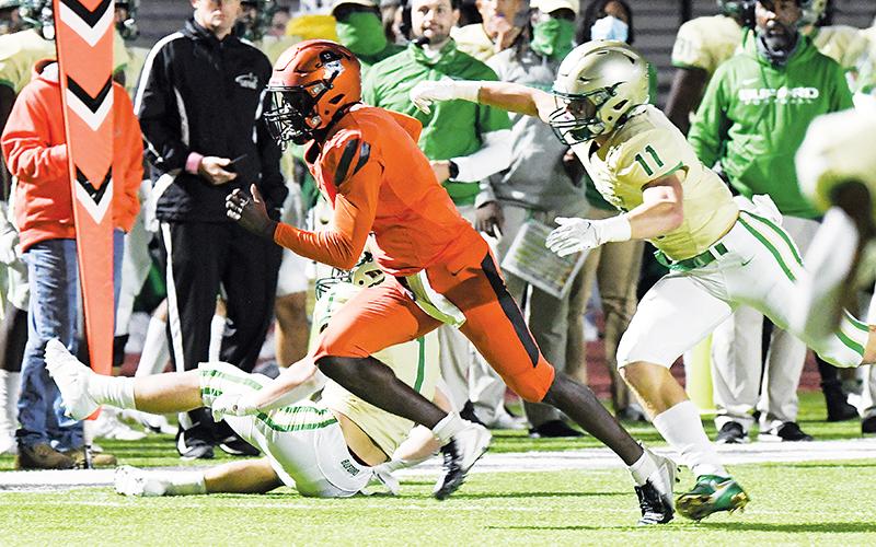 Habersham Central’s Joshua Pickett escapes a Buford defender earlier this season. TOM ASKEW/Special