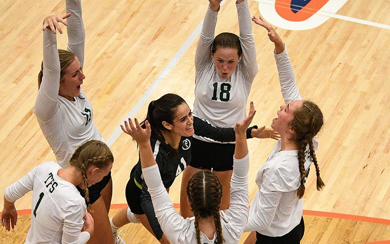 Tallulah Falls’ volleyball team celebrates a point during their win Tuesday. BRIAN CARTER/Special