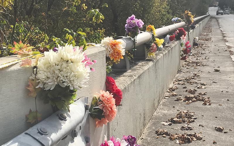 Members of the Clarkesville community left flowers on the Homer Sutton Bridge on Highway 197 in memory of Shane Justice earlier this week.