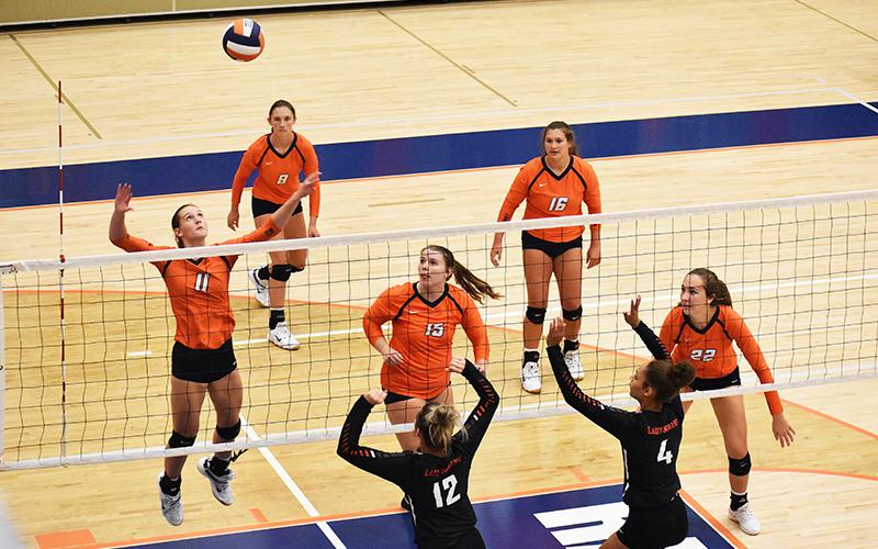 Habersham Central’s Allie Church goes for a spike during a recent game.
