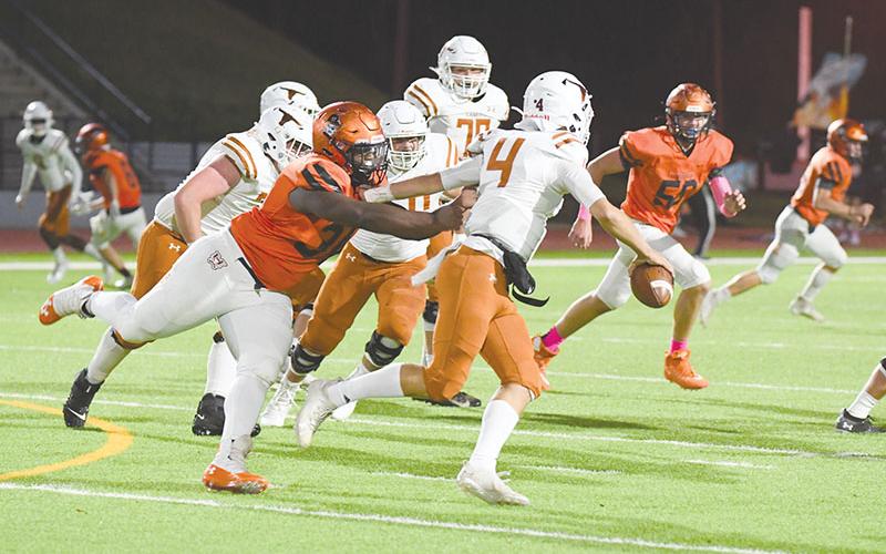 Habersham Central’s Avian Shields tracks down Lanier quarterback Andrew Blackford for a sack during Friday’s game. TOM ASKEW/Special