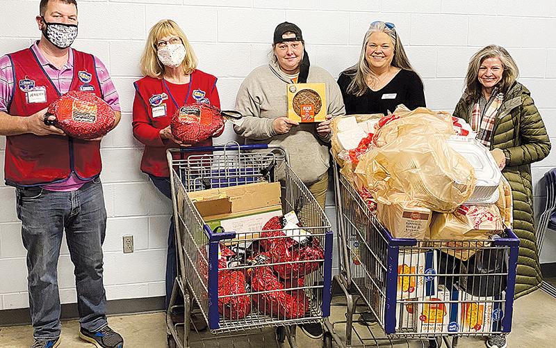 Shown (from left) are Lowe’s Cornelia Store Manager Jeremy Gattis, Lowe’s Cash Management Specialist Marianne Longerbone, Family Resource Center Home Visiting Coordinator Melanie Allen, volunteer Cynthia Wade and Family Resource Center Board Member Leigh Johnson. MELANIE ALLEN/Submitted
