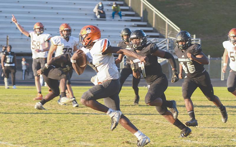 Habersham Central’s Joshua Pickett takes off for a game-sealing touchdown against Shiloh on Nov. 21. TOM ASKEW/Special