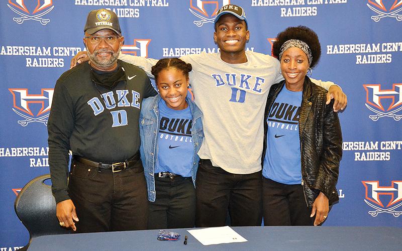 Habersham Central’s Joshua Pickett is joined at his signing ceremony Wednesday by his dad Harold, sister Kaylin and mom Angelia.