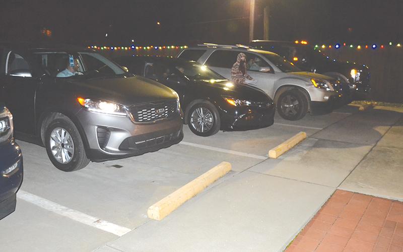 Mt. Airy’s town council members stayed in their cars Monday night and voted by reaching out the window.