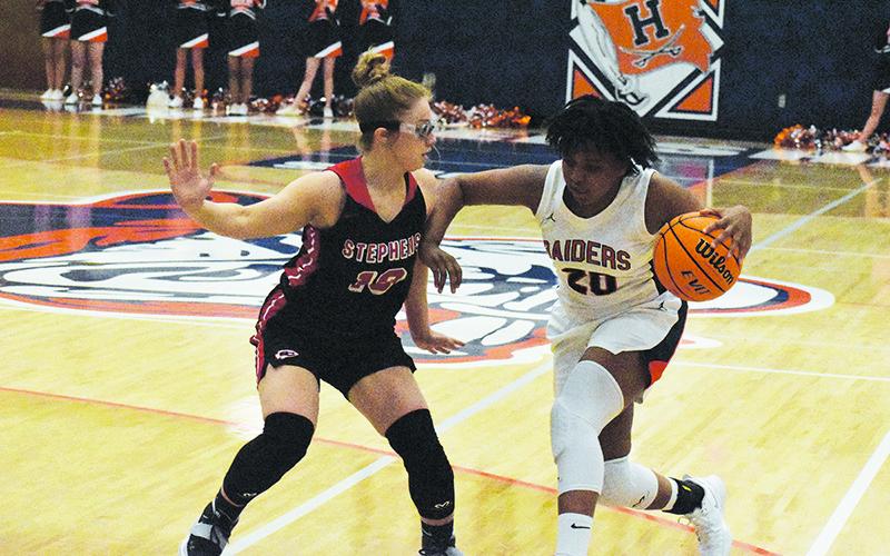 Habersham Central's Nykerriah Brown looks to shed a defender during the Lady Raiders' first game against Stephens County Dec. 4.