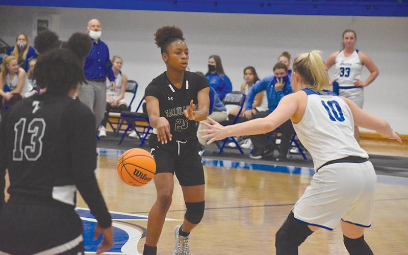 Tallulah Falls’ Denika Lightbourne passes during the Lady Indians’ win over Towns County on Dec. 3.