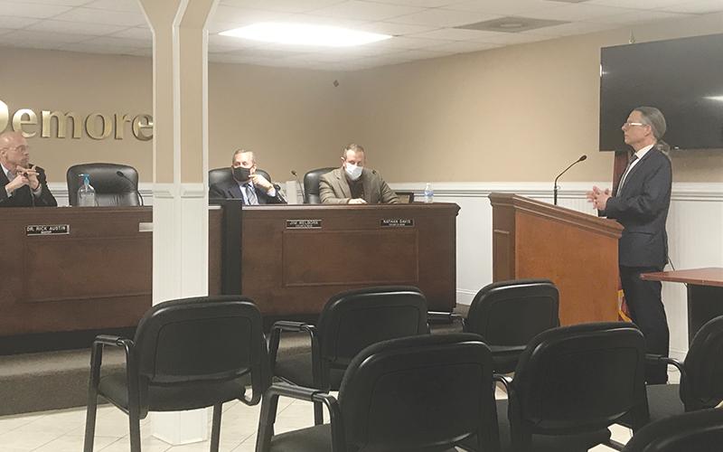 New Demorest City Attorney Thomas Mitchell (right) talks with the city council Tuesday night, including (from left) Mayor Rick Austin and Councilmen Jim Welborn and Nathan Davis.