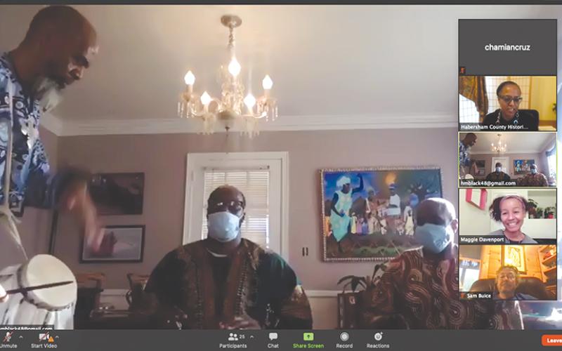 Harun Black, left, plays the kutiro drums along with his son Jahbri Black and Raymond Simmons in this screenshot of the 2021 MLK Day Virtual Celebration. They are part of a group called Bantaba East. The kutiro drums are originally of the Mandinka people of The Gambia, West Africa. They have been drummers for 30 years.