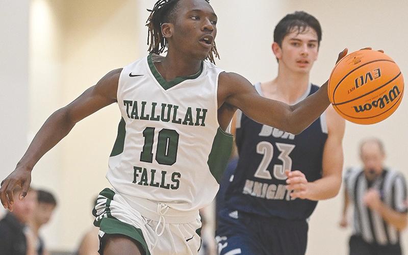 Tallulah Falls’ Simeon  Respress takes off down court during Friday’s win over George Walton Academy. RANDY CRUMP/Special