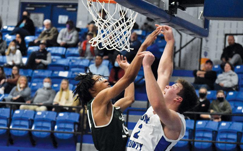 Tallulah Falls’ Julian Gober blocks Towns County’s Jake McTaggart during a Dec. 3 game. The Indians have not lost since that night 50 days ago.