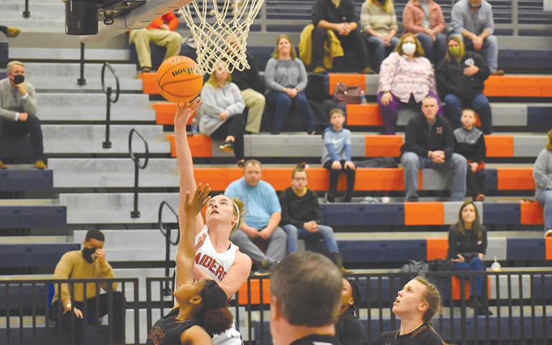 Habersham Central’s Taylor Wade drives to the hoop during Friday night’s win over Lanier.