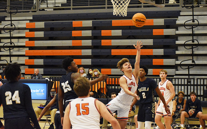 Habersham Central’s Cade Williams drives to the basket and converts on a layup for two of his 13 points.