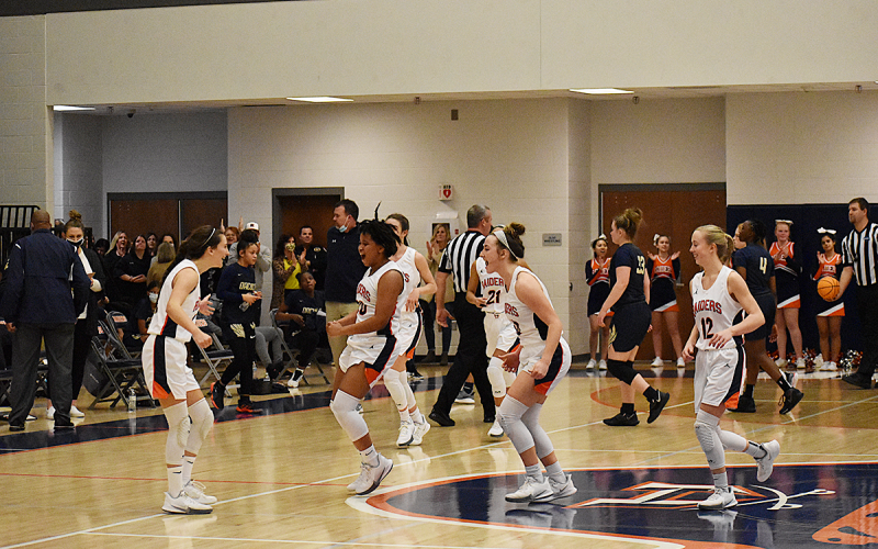 Habersham Central Lady Raiders players celebrate after their win over Dacula
