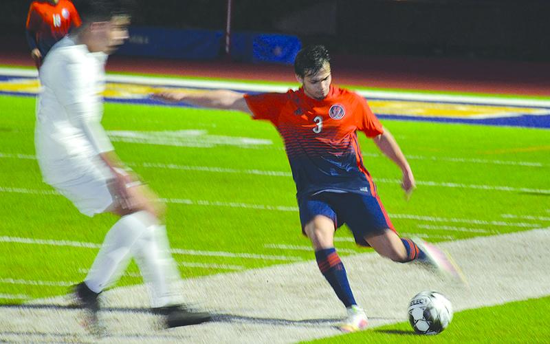 Habersham Central’s Angel Zavala boots the ball downfield during Tuesday night’s win over Gainesville.