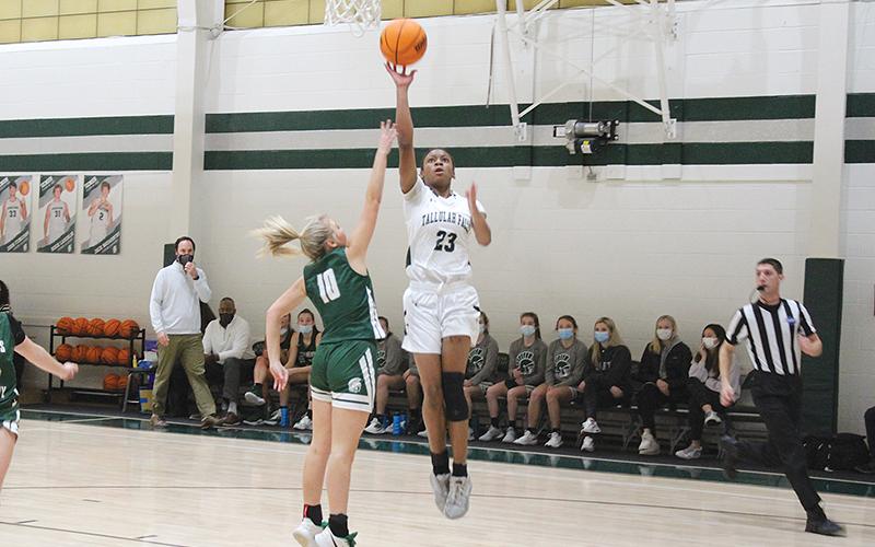 Denika Lightbourne elevates for a layup in Tallulah Falls’ 10-point loss to Athens Academy in the region championship. The sophomore finished with a team-high 20 points in the loss.
