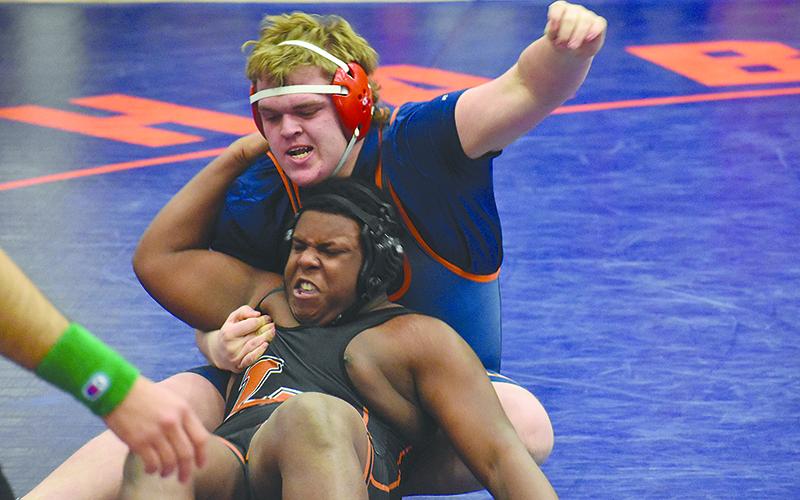 Habersham's Lukas Ricci gets a hold of his opponent during Saturday's semifinals.