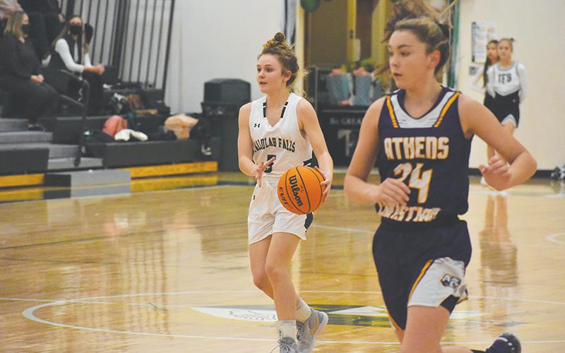 Tallulah Falls' Molly Mitchell looks to set up a play earlier this season against Athens Christian.
