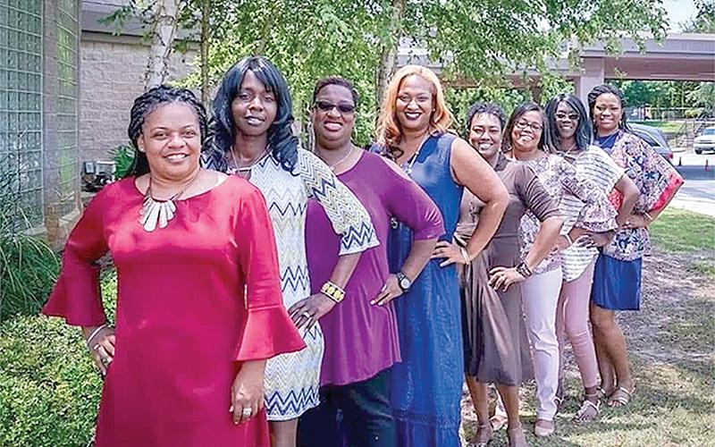 Members of the Reading Divas at the height of their membership included (front to back) Monique Rucker, Tanya Rucker, Tara Young, author Kimya Motley, Lisa Teasley, Kerri Davis, Christie Babers and Talara Deshazer.