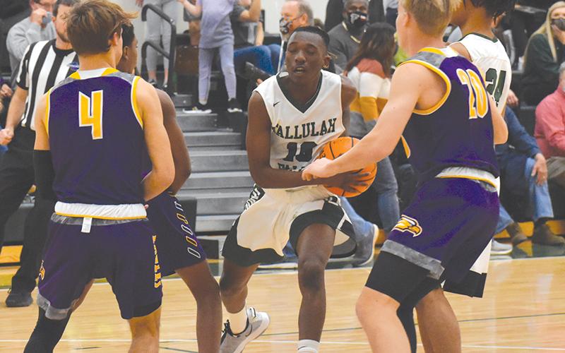 Tallulah Falls' Simeon Respress weaves through traffic during the Indians' win over Athens Christian.
