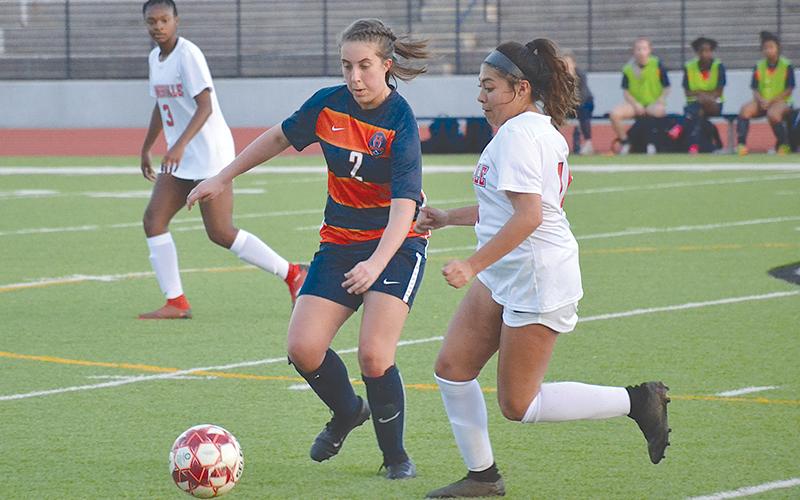 Habersham Central’s Ryalie Acker looks to get past a defender during a Feb. 9 game against Gainesville High.