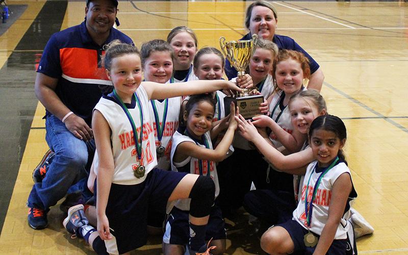 The 8U Lady Raiders All-Star team won the GRPA Class B state championship Saturday with a 27-14 win over the Barrow County All-Stars. Pictured are team members (front, center) Chanelle Mattox, (middle, from left) Jansyn Purdy, Whitley Rider, Brinkley Gilleland, Kamryn McEntire, Teagen Hicks, Hadley Lovvorn, Ellie Sanders, Sophia Alvarez, (back) coach Jeremy Mattox and coach Brandy Lovvorn.