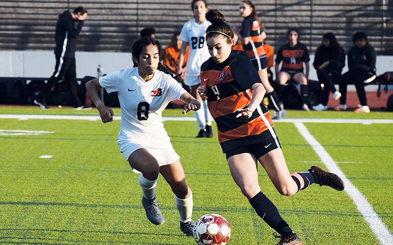 Habersham's Anna LaBarbera tries to beat a defender in an earlier home game.