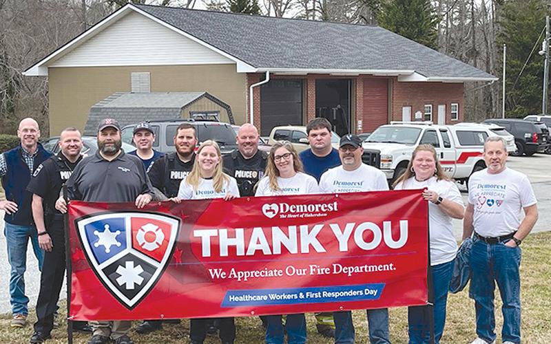 The city of Demorest recognized first responders at the fire department. From left are Mayor Rick Austin, Officer Casey Chastain, Chris Simmons, Michael Hall, Ty Moss, Mary Ellen Smith, Chief Robin Krockum, Amanda Carr, Jonathan Knight, James Minutello, Amy Payne and Councilman Jim Welborn.