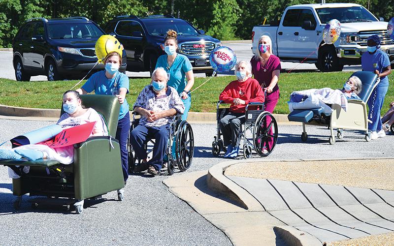 Habersham Home held a parade for its residents to see family members in July. Their loved ones can come visit once again, but with only a quarter of the residents vaccinated.