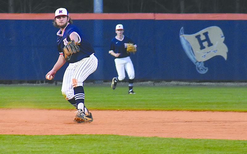 Habersham Central’s Logan Hare fires to first during Thursday’s game.