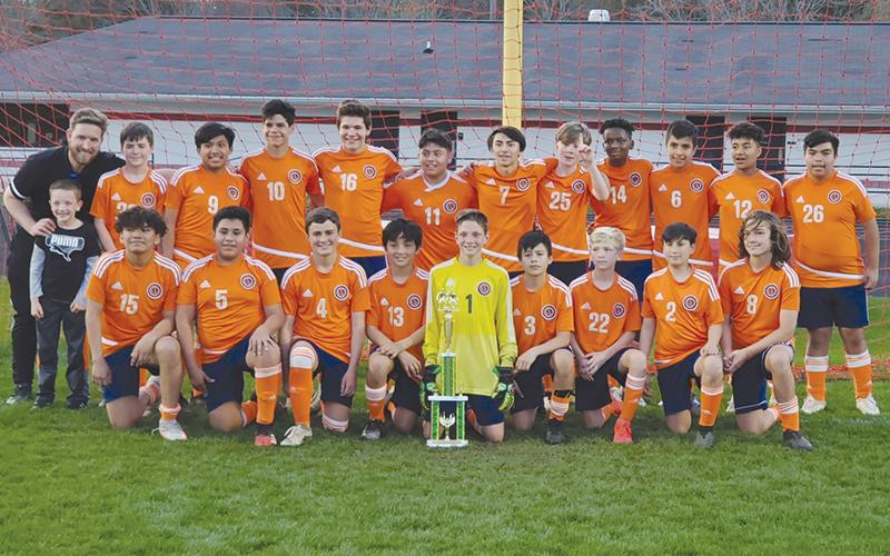 The Habersham Raiders soccer team celebrates their middle school championship. Front row (from left) are Manuel Gudion, Jonathan Felipe Ortiz, Payton Adams, Juan Labistida, Evan Smith, Chris Lara, McKenzie Kyle, Eli Maye and Bailey Webb. Back row are coach Sam Steele (with son Charlie), Ethan Green, Moises Diego, Diego Alcarez, Simon Doran, Alex Velasquez, Angel Vallejo, Camden Meads, Khamchan Laosaile, Jeshua Ramirez, Uriel Vallejo and Bryan Ramirez.