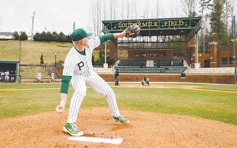 Piedmont's Peyton Irvin warms up before an inning during a recent home game. KARL L. MOORE/Special