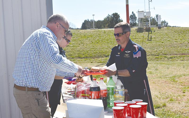 Master Flight Paramedic Frank De Armas (right) was honored on Friday for his 20 years of service, which is a rare accomplishment in the industry.
