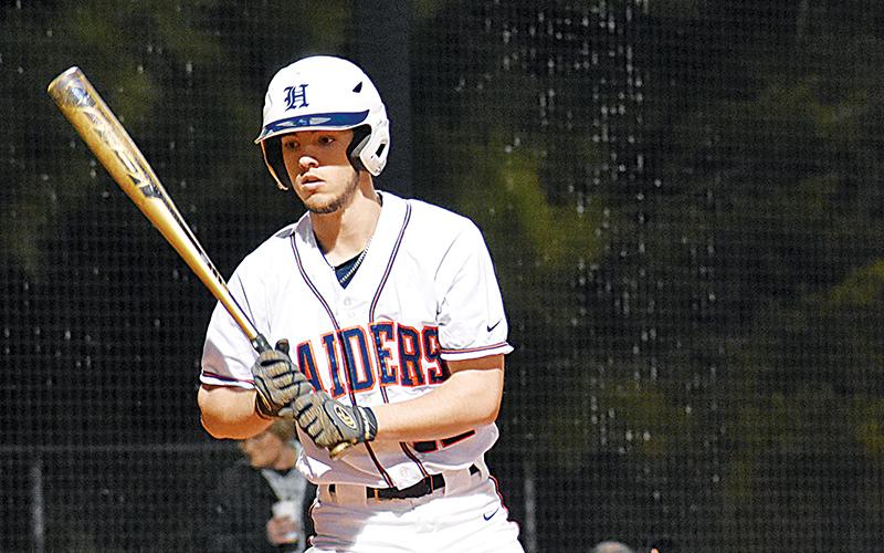 Trevor Stevens looks for the signs during a turn at-bat during Monday’s game. CODY ROGERS/Staff