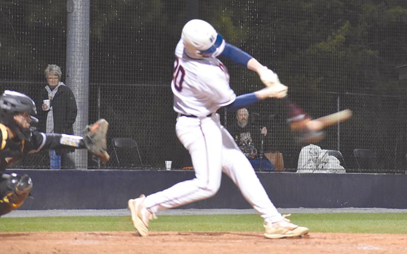 Habersham Central’s Sutton Dover connects for a hit against Central Gwinnett. CODY ROGERS/Staff