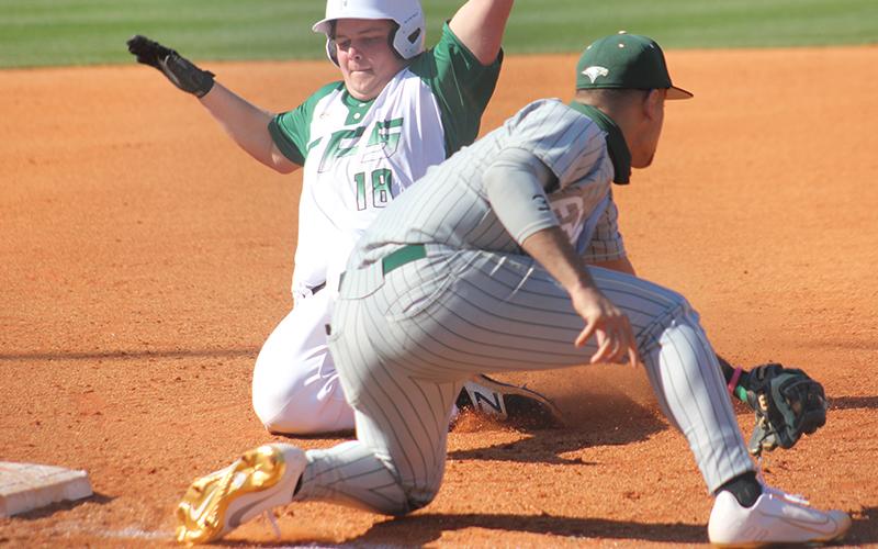 Tallulah Falls’ Aiden Gragg barely beats the tag of Rabun Gap third baseman Sabien Rivera.