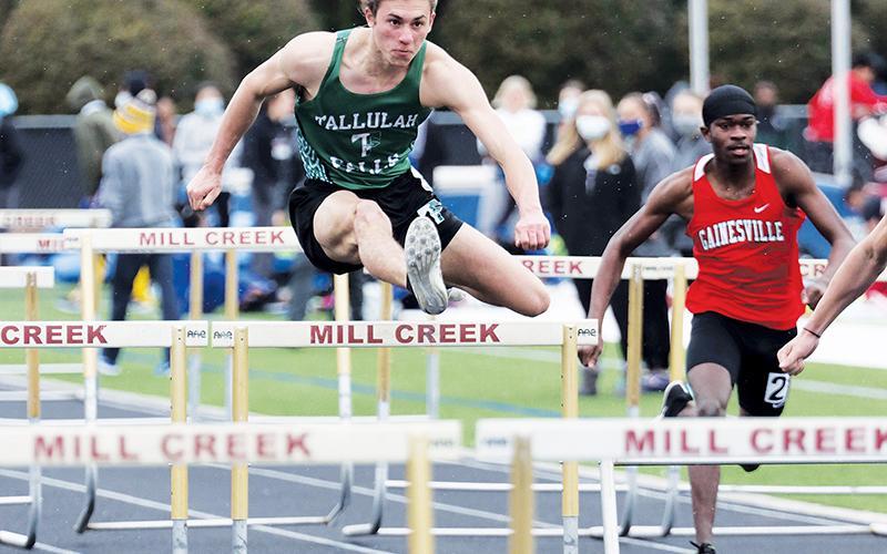 Tallulah Falls’ Grey Bourlet runs the hurdles at Mill Creek.