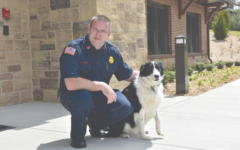 Cornelia Fire Marshal Josh Hazle and his dog Chloe have been working together at the fire department for four years.